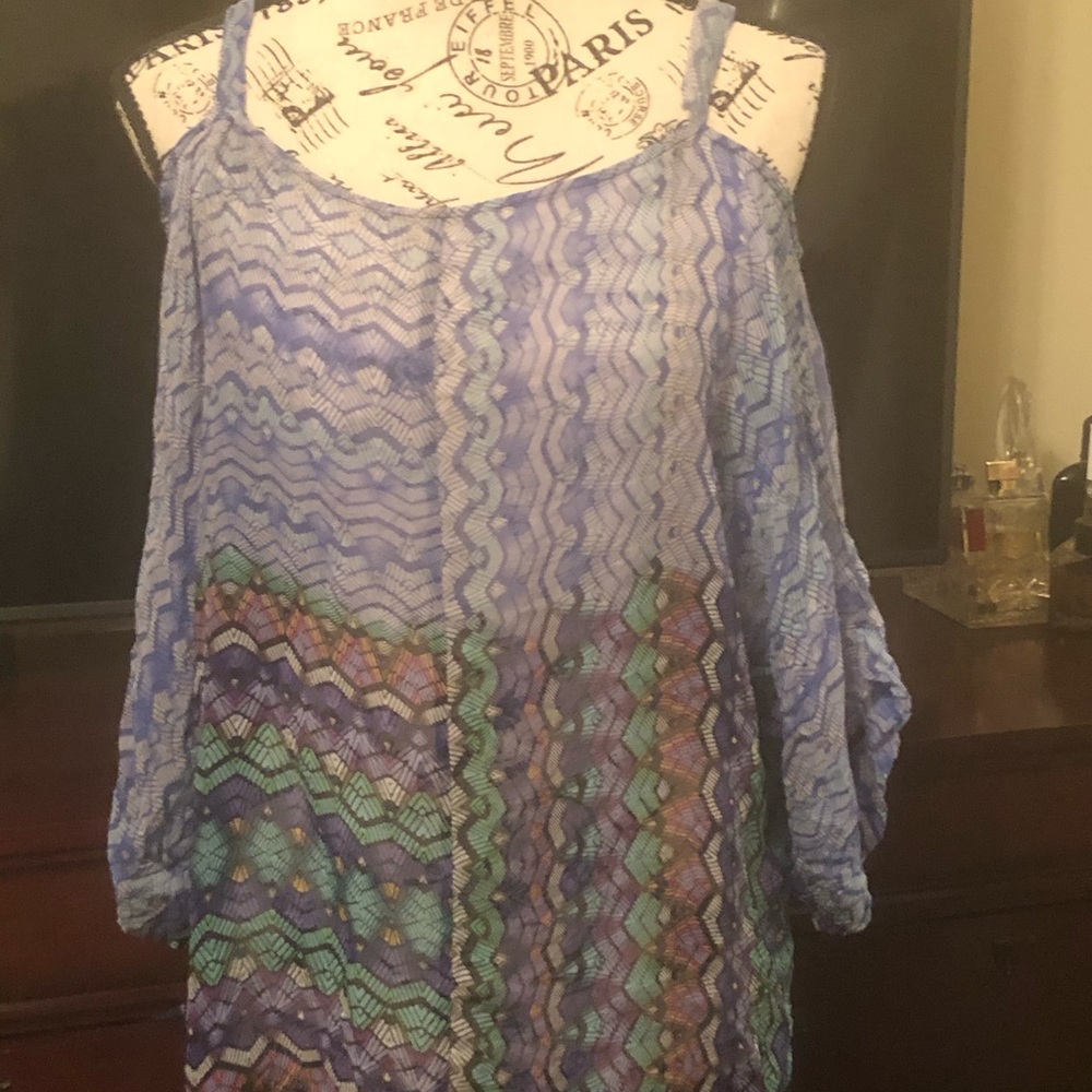 Silk Language Blouse with straps on shoulders.